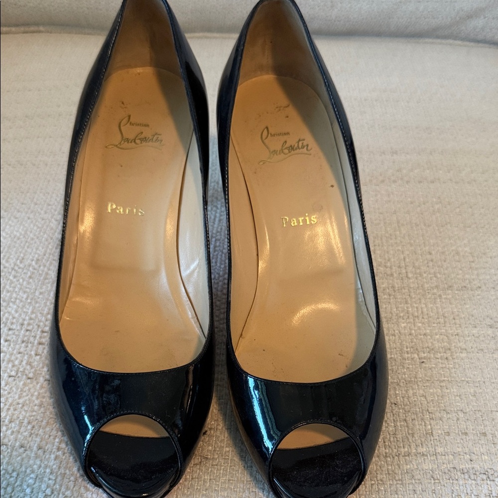 Christian Louboutin Glossy Black Peep-Toe Heels Gently worn.